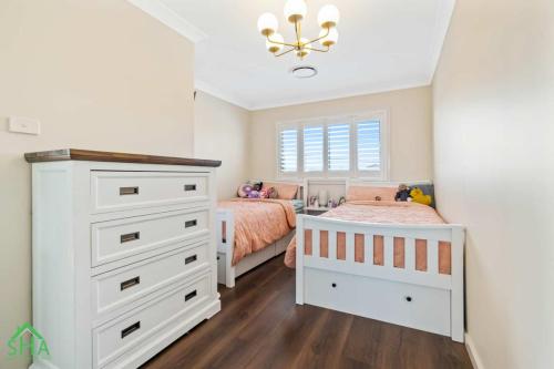 Children's bedroom in a 70m² second storey addition built by Smart Home Additions in Jordan Springs
