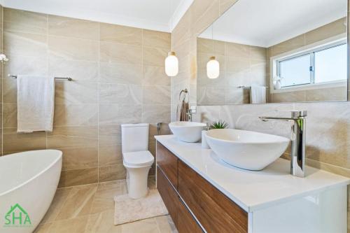 Luxury bathroom within a 70m² second storey addition built by Smart Home Additions in Jordan Springs NSW
