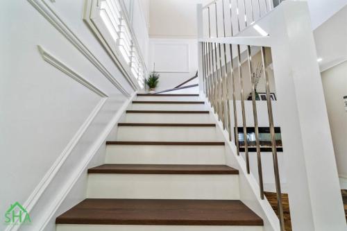 Timber staircase in a 70m² second storey addition built by Smart Home Additions in Jordan Springs