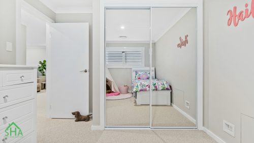 Newly completed upstairs bedroom in second storey addition Gledswood Hills 70m2 built by Smart Home Additions