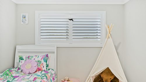 Bedroom with plantation shutters in second storey addition Gledswood Hills 70m2 built by Smart Home Additions