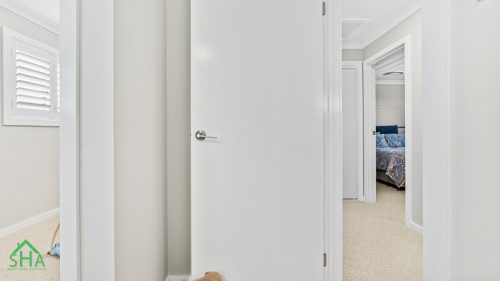 Modern interior door hardware in second storey addition Gledswood Hills 70m2 built by Smart Home Additions