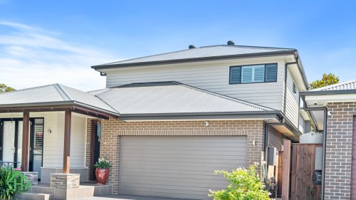 Modern facade upgrade through second storey addition Gledswood Hills 70m2 built by Smart Home Additions