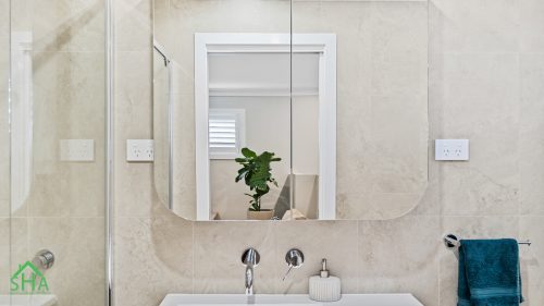 Bathroom mirror and vanity in second storey addition Gledswood Hills 70m2 built by Smart Home Additions