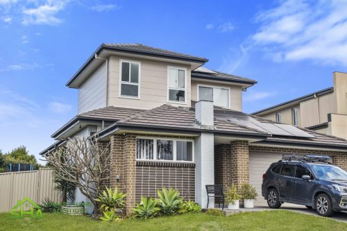 External street Front view Angled exterior view of second storey home addition of completed 60m² second storey addition in Mount Annan