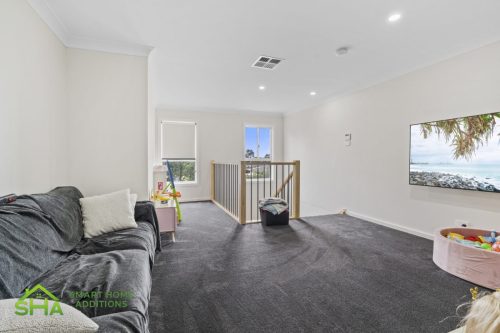 Open-plan living space in 60m² second storey addition in Mount Annan