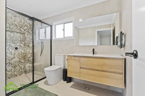 Contemporary bathroom in 60m² second storey addition in Mount Annan