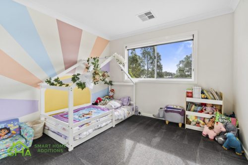 Children's bedroom in 60m² second storey addition in Mount Annan